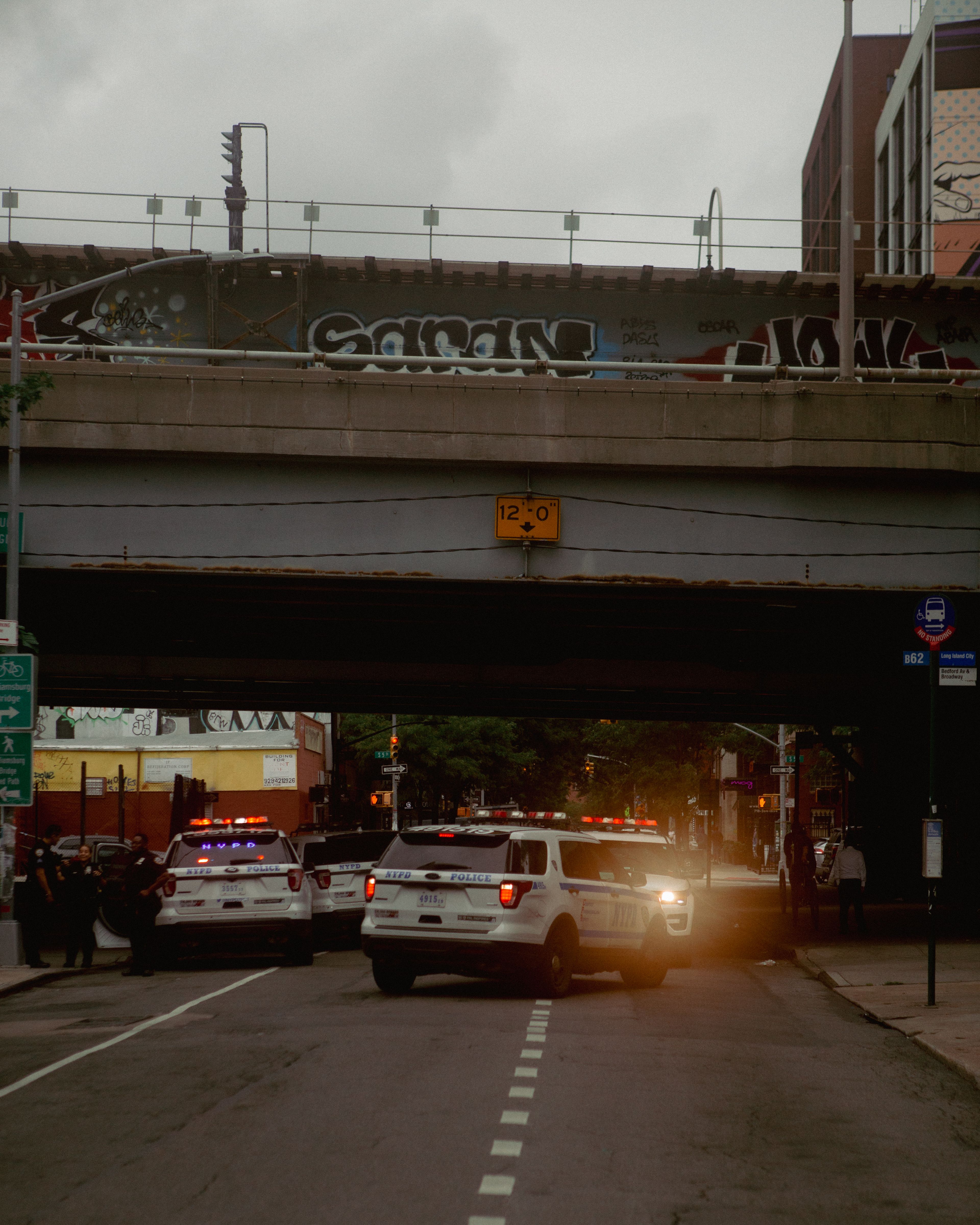 City street with police vehicles. (Representative Cover Image Source: Pexels | Photo by Yura Forrat)