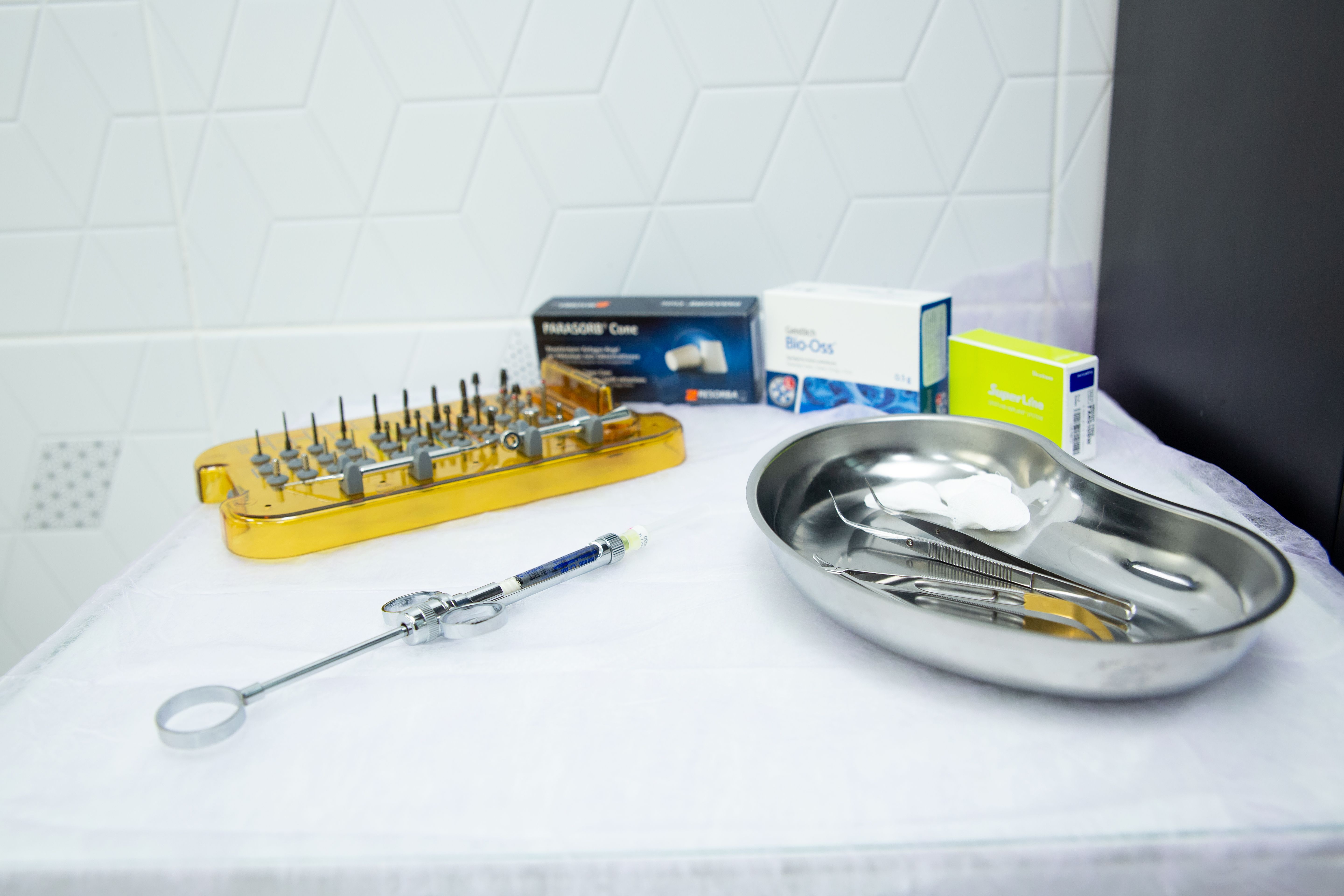 A set of sterile medical instruments and boxes on a table. (Representative Cover Image Source: Pexels | Photo by Ivan Babydov)
