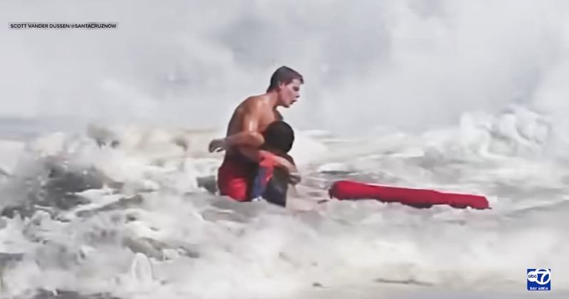Teen lifeguard rescuing drowning 10-year-old was hit by a monster wave. Instead of fighting it, he gave in