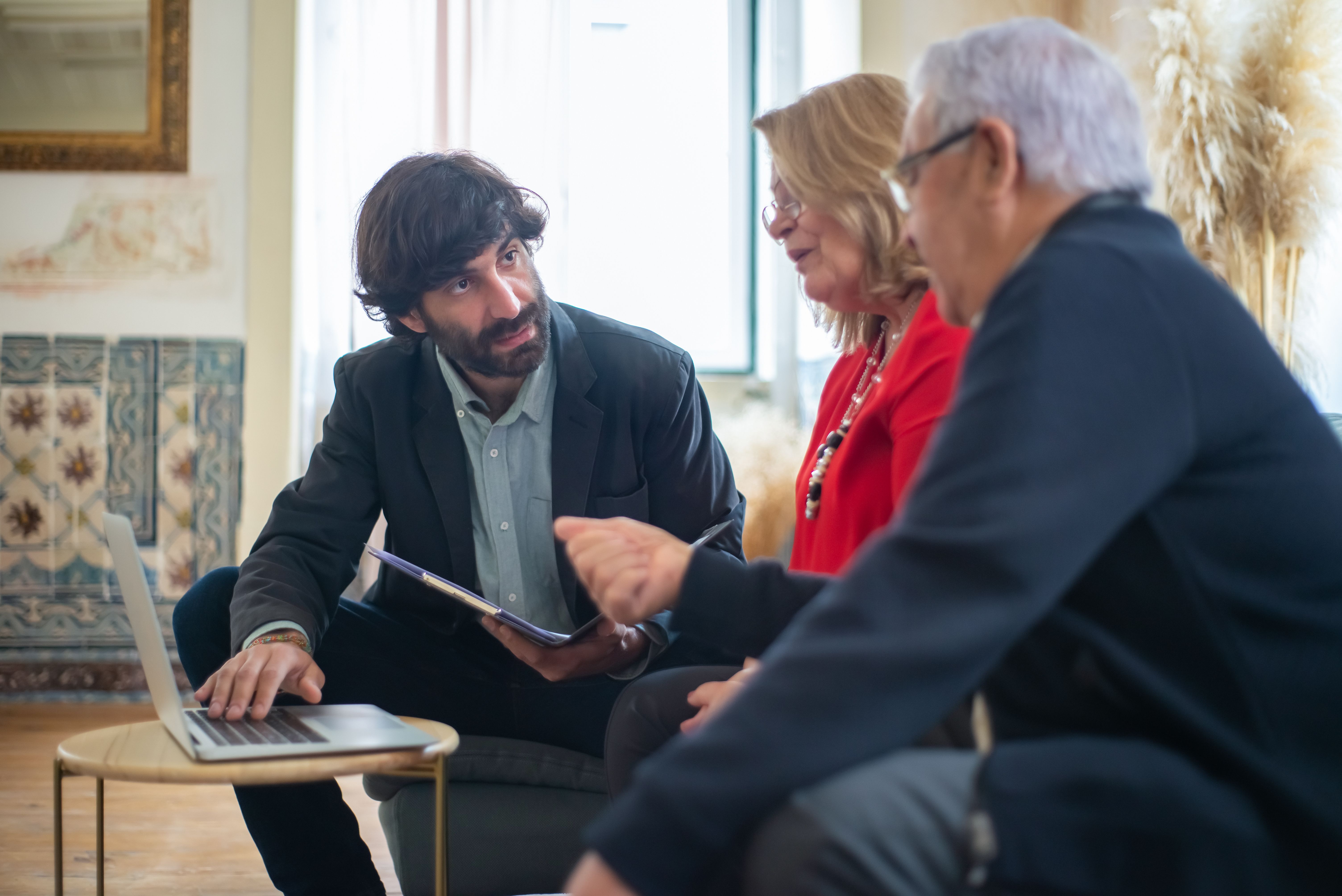 Three people having a discussion. (Representative Image Source: Pexels | Photo by Kampus Production)