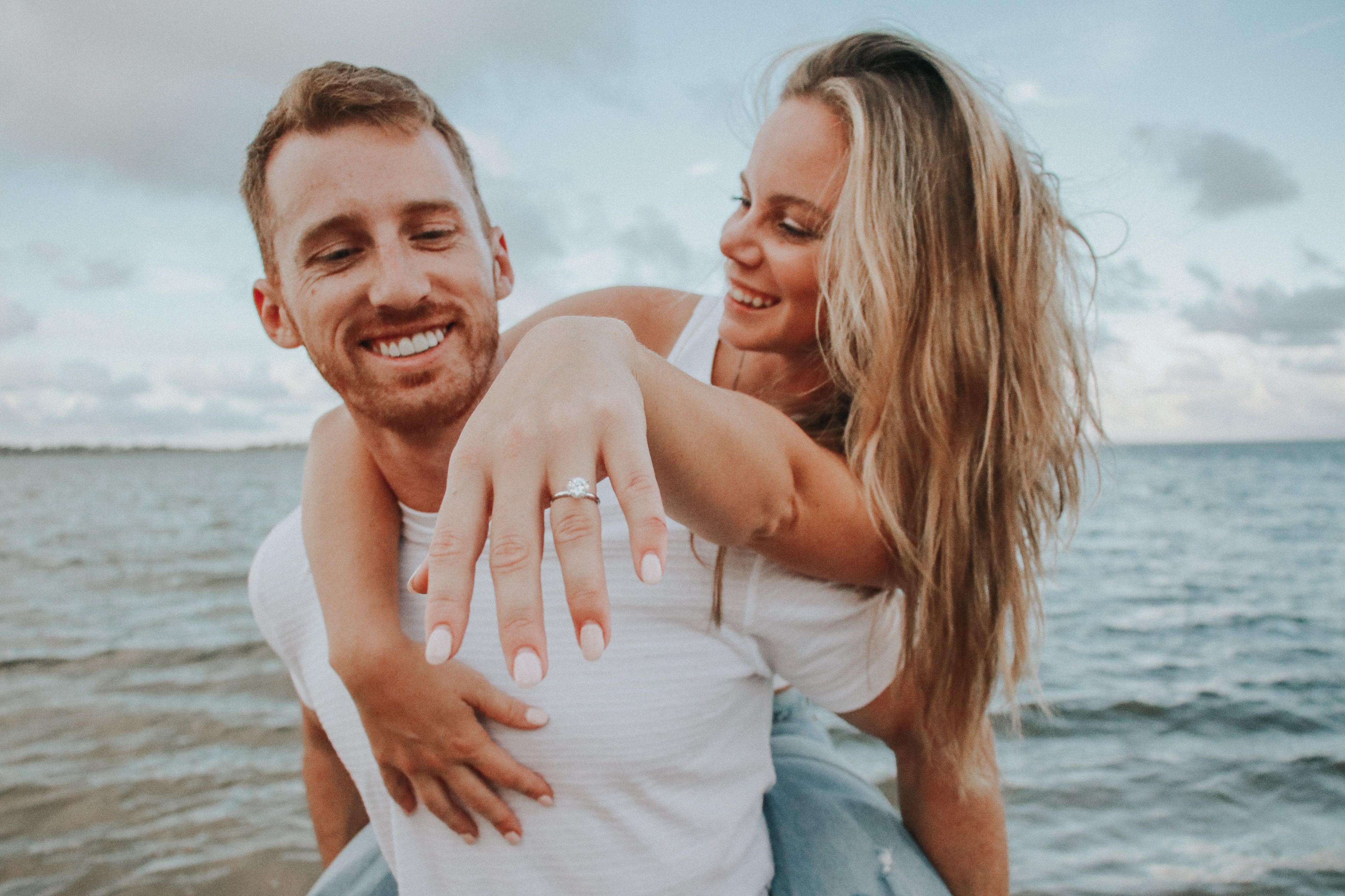 Man and woman enjoying time together and woman flashing engagement ring on her finger (Representative Image Source: Pexels | photo by )
