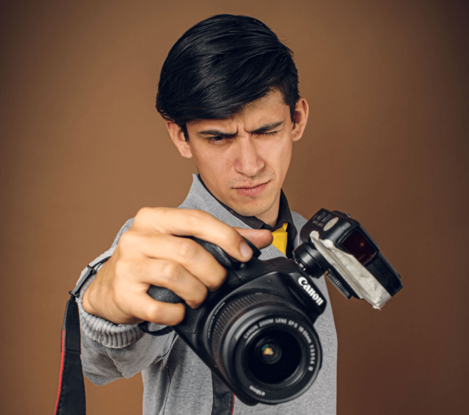 Photographer flashing his camera with attitude (Representative Image Source: Pexels | Photo by )