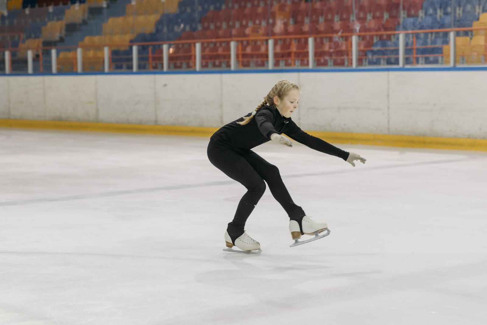 Girl skating skilfully on ice in a rink (Representative Image Source: Pexels | Photo by )