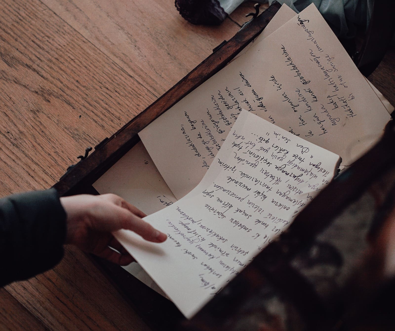 Woman reading old vintage letters (Representative Image Source: Pexels | Photo by furqanfdemir)