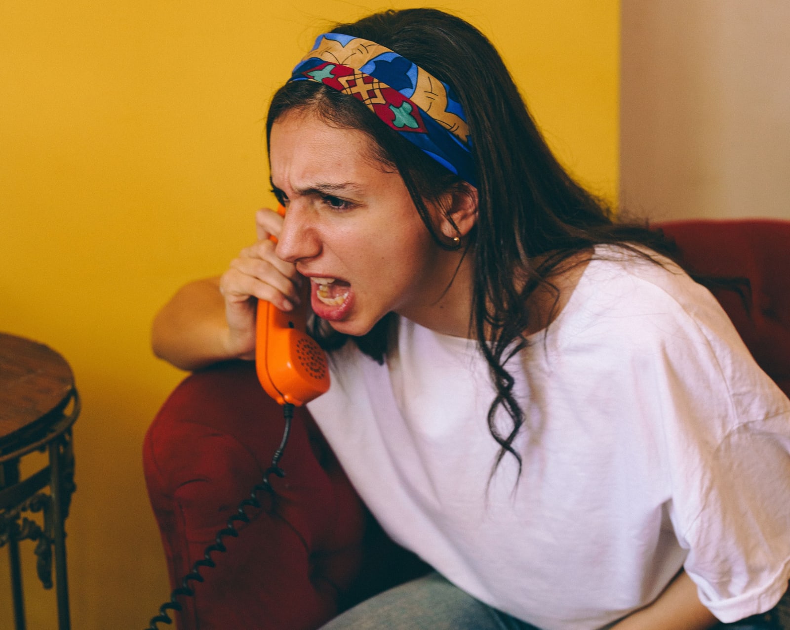 Woman talking on phone with a confusing expression (Representative Image Source: Pexels | Photo by )