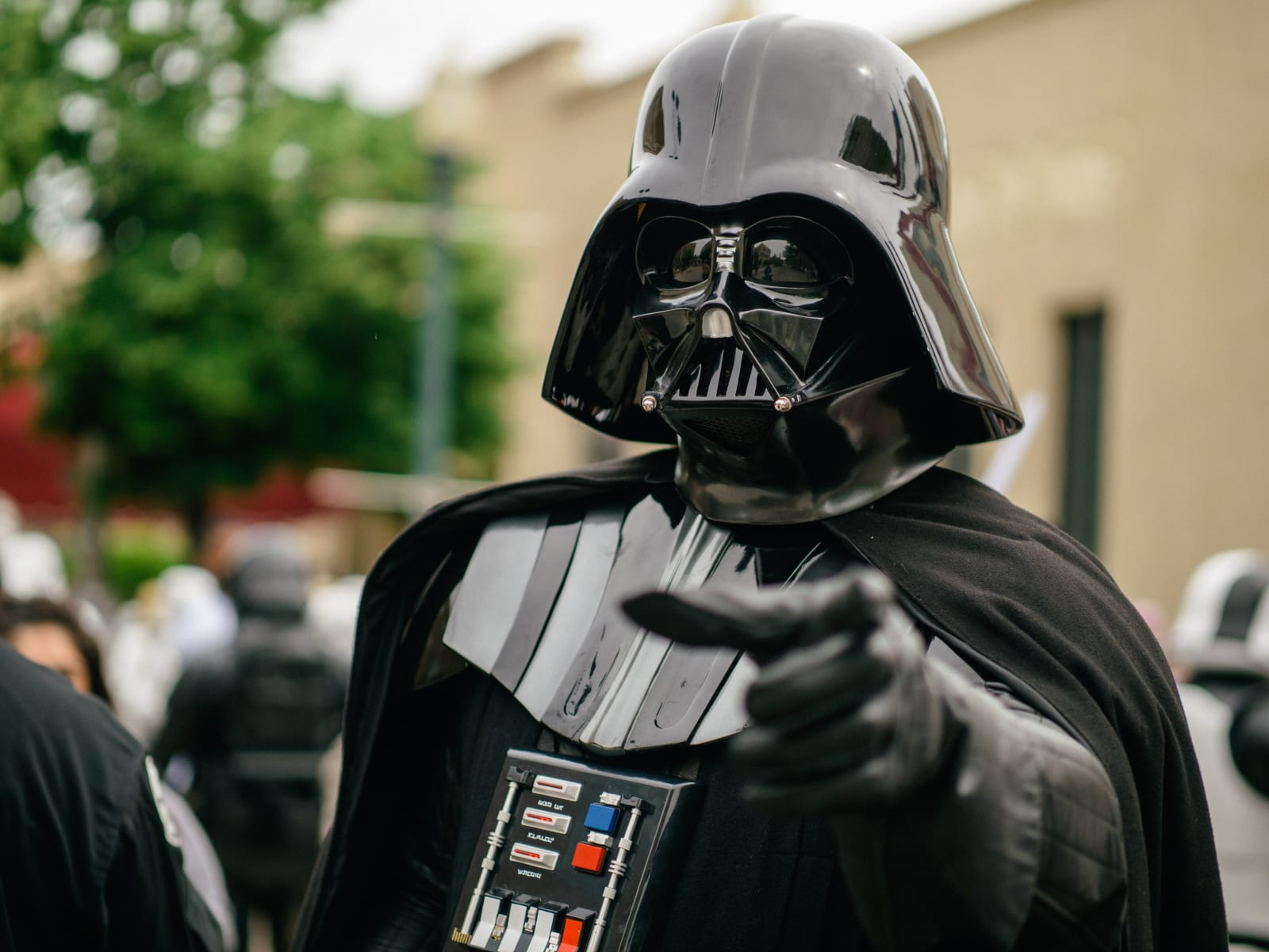 Darth Vader cosplayer pointing in an outdoor setting, showcasing detailed costume and helmet. (Representative Cover Image Source: Pexels | Photo by Otto Rascon)