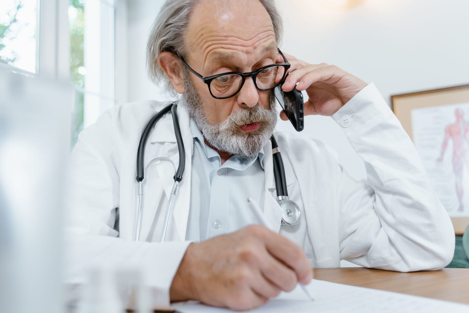 Doctor saying no to someone on a phone call (Representative Image Source: Pexels | Photo by Tima Miroshnichenko)