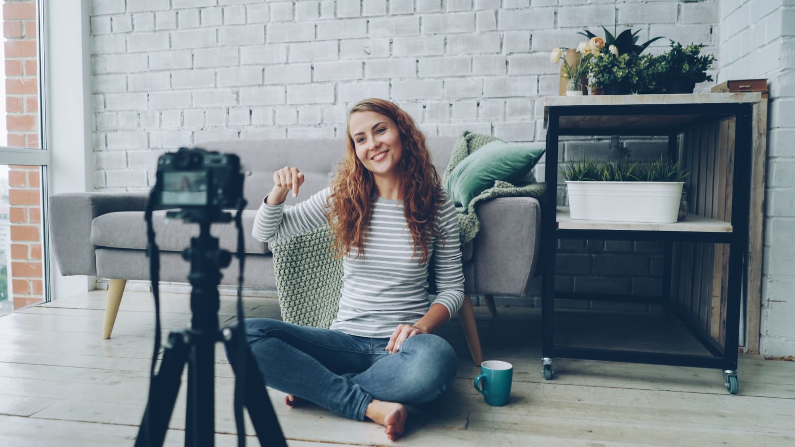 Pretty woman recording a video tutorial on camera (Representative Image Source: Pexels | Photo by Vitaly Gariev)