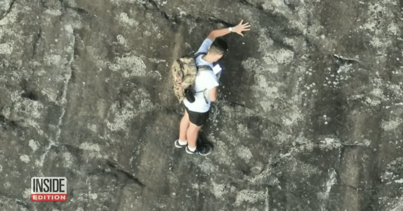 Free climber was stranded on a tiny ledge 250 feet above the ground. After 47 minutes, he had one thing to say about his dad