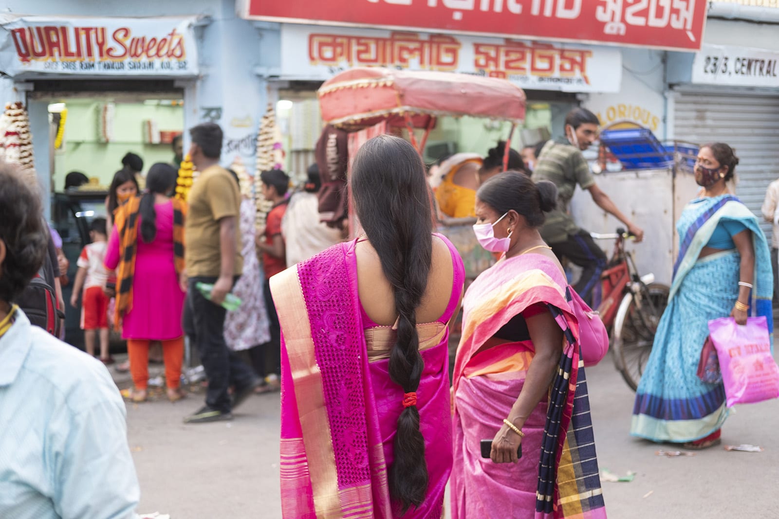 Women wearing pink outside.