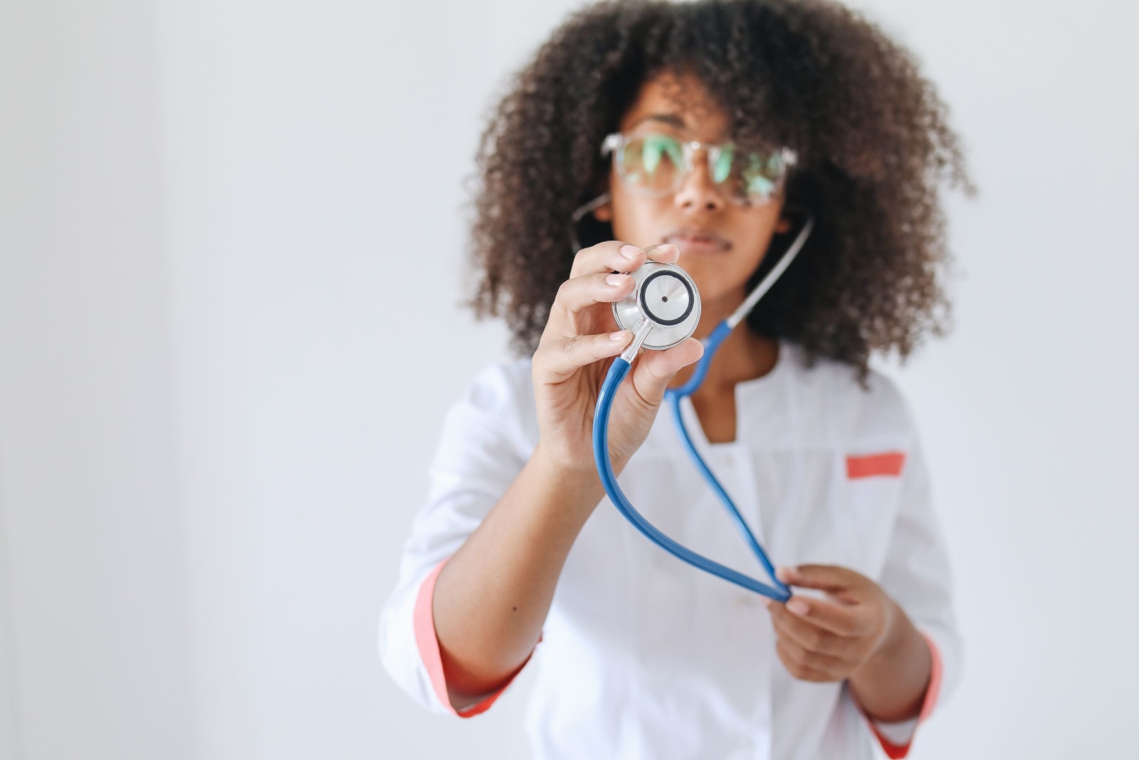 Female doctor in doctor's coat and instruments (Representative Image Source: Pexels | Photo by Polina Tankelevitch)