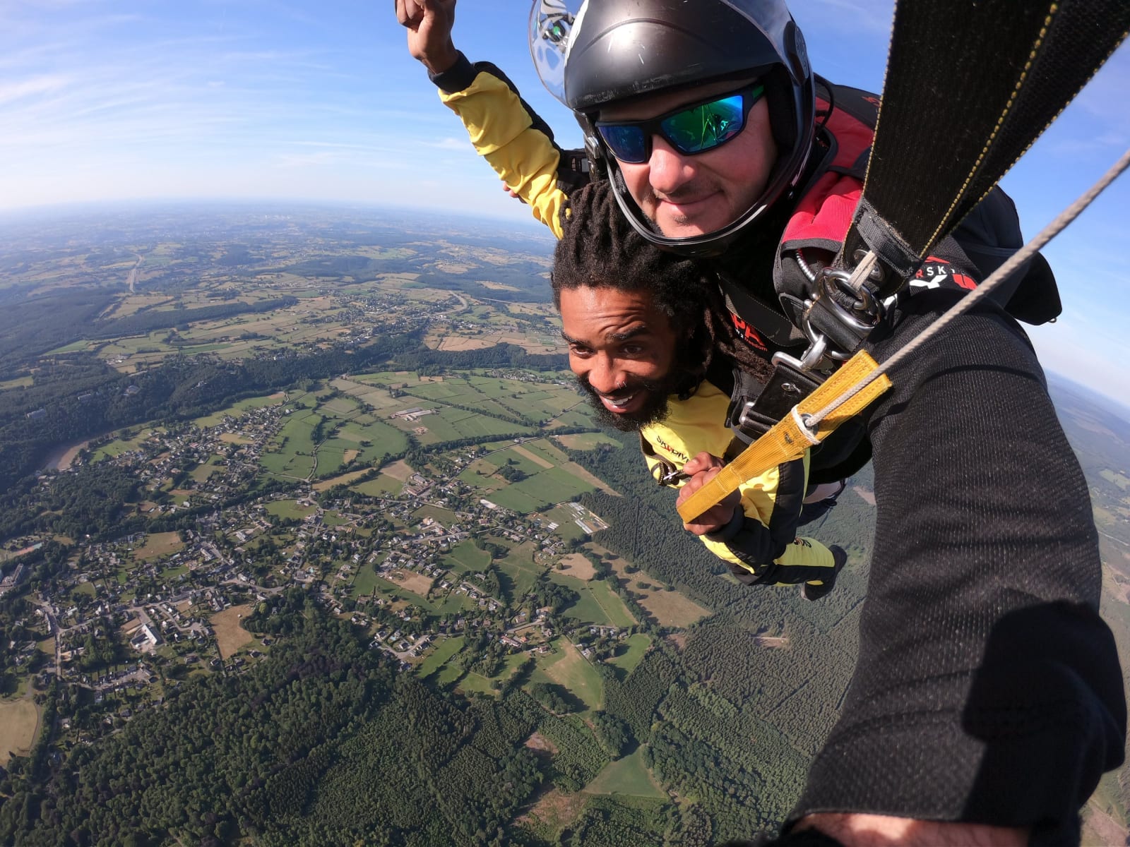A man strapped to the harness during skydiving (Representative Image Source: Pexels | Photo by Russ Jani)