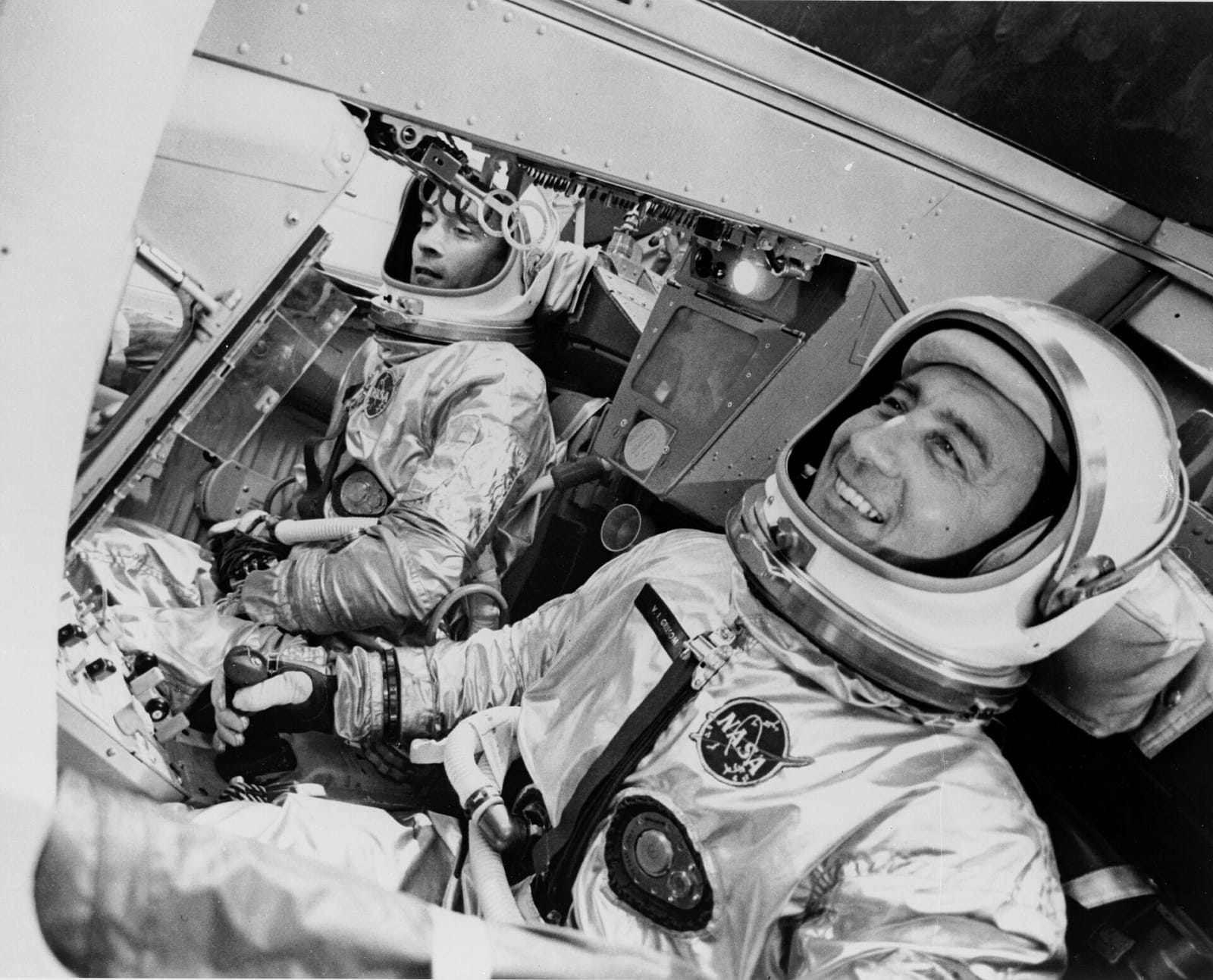 The Prime Pilots selected for the first manned flight of NASA's Project Gemini undergo a flight test profile in a mockup Gemini Spacecraft. Visible in the photo are Astronauts Virgil I. Grissom (left), GT-III Command Pilot; and, John W. Young, Pilot. MDAC, ST. LOUIS, MO (Most popular GT-III photograph) B&W