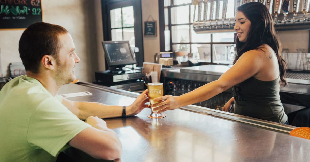 Man stared at a bartender for 4 hours while pretending to talk to security, then offered dinner as her tip. She said she'd rather have his $2