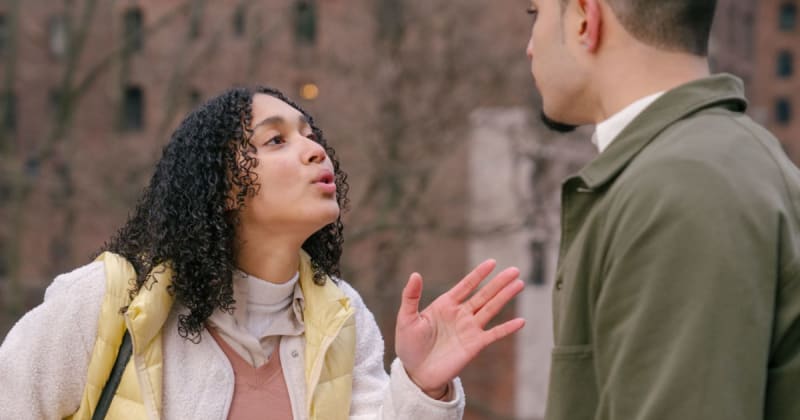 Man pounded his fists and yelled at his girlfriend in a park, so a bystander stepped in. He snapped 'mind your business' — but she wouldn't leave